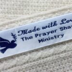 Praywer Shawl labels with dove